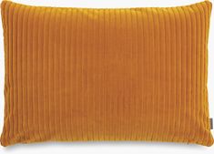 an orange pillow with pleated edges on a white background, it is made from corded fabric