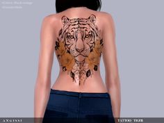 a woman with a tiger tattoo on her back is shown in front of the camera