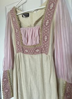 True vintage Gunne Sax dress with rare, black label in a Renaissance style. This was bought from a closing theatre company so it has been pre-loved. I believe it may be from 1969. There are some flaws - pilling and tiny holes that have been sewn. Please review pictures before purchasing. Zipper in back and on the sleeves.  Unsure of the size, but I would say around an XS. 60s Medieval Revival Fashion, Vintage Dresses For Costume Party With Historical Design, Vintage Dresses With Historical Design For Party, Vintage Party Dress With Historical Design, 1970s Medieval Revival, Vintage Empire Waist Costume Dress, Vintage Dress With Historical Design For Costume, Vintage Spring Costume Dresses, Vintage Dresses For Costume Spring Festival