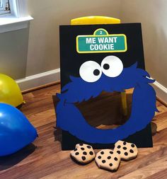 cookie box with cookie cookies in front of it and an image of the cookie monster