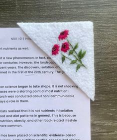 a piece of paper with some flowers on it