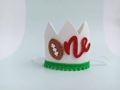 First Year Down crown for your baby's birthday! Perfect for photo shoot or birhtday party! Crowns are attached to a white elastic headband and meant to be worn around the back of the head, behind the ears (not under chin. Сrown size: height 2,56 inch (6,5 сm)and width 2,56 inch (6,5 cm) Please contact me if you have any questions regarding color of crown or regarding the number indicating the age and if you wish I will create a similar product but in the color you want. Fun White Party Supplies For Birthday, White Fun Party Supplies For Birthday, Fun White Birthday Party Supplies, Playful White Party Supplies For First Birthday, Cute White Party Supplies For Gifts, Cute White Party Supplies For Gift, Football Birthday, 1st Year, Birthday Crown