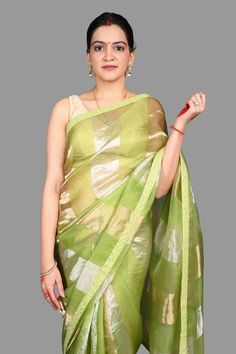 Pista green, silver and gold saree crafted in pure organza silk with broad zari striped pattern and bloom border detailing. Comes with an unstitched blouse piece. - Aza Fashions Green Chanderi Blouse With Sheer Dupatta, Festive Fusion Pre-draped Saree With Unstitched Blouse, Green Pre-draped Saree With Self Design For Diwali, Designer Wear Pista Green Saree, Green Tissue Silk Blouse With Dupatta, Green Cotton Silk Blouse With Dupatta, Elegant Green Chanderi Blouse, Fusion Style Pre-draped Saree For Festivals With Unstitched Blouse, Festive Green Chanderi Blouse