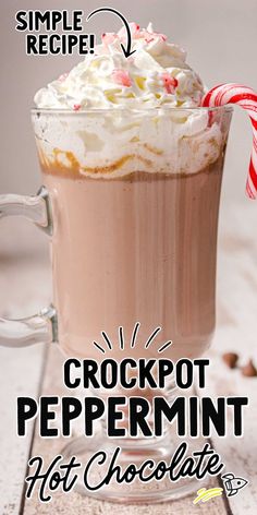 a hot chocolate drink with whipped cream and candy canes