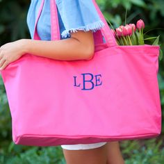 We love our Ultimate Tote and we know you will too! It is perfect to take tailgating or on weekend trips! You will not want to pack with anything else. The six open pockets and one zippered pocket that line the inside and the long handles make this the ultimate tote that carries all! 21” L x 11” W x 13.5” H Polyester Interior Lining Easy-to-Carry Handles Interior Zipper Pocket 6 Interior Open Pockets Reinforced Bottom Utility Tote Bag, Large Utility Tote, Bridesmaid Tote Bags, Embroidered Tote Bag, Utility Tote, Monogram Tote Bags, Embroidered Tote, Travel Bags For Women, Explosion Box