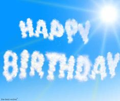 the words happy birthday written in white clouds on a blue sky with sun flares