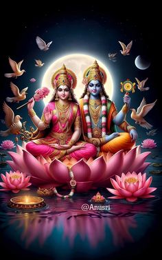 two deities sitting on top of a lotus