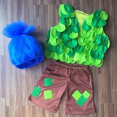 a child's costume and hat on the floor