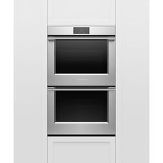 an oven built into the side of a white cabinet with two doors and one door open