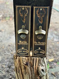 there are two wooden signs on the side of a tree stump that says martin and the mountains