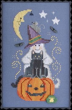 a cross stitch pattern with two cats sitting on top of a jack - o'- lantern