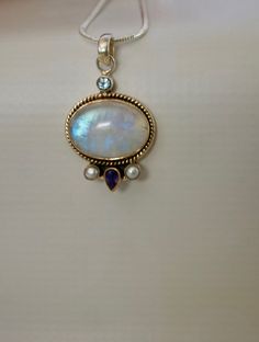 Beautiful Moonstone, Iolite, Pearl, Blue Topaz Pendant And Silver. Chain is not included. Incline Village, Blue Topaz Pendant, Topaz Pendant, Green Tourmaline, Blue Topaz, Moonstone, Tourmaline, Silver Chain, Topaz