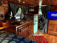 an old fashioned kitchen and living room in a mobile home