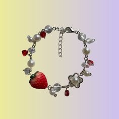 Adjustable strawberry charm bracelet - a perfectly adorable and easy gift option! don't forget to pair with our Strawberry pearl necklace! Casual Beaded Bracelets With Lobster Clasp As Gift, Casual Charm Bracelet For Valentine's Day Gift, Casual Jewelry With Fruit Design For Gifts, Trendy Berry Colored Jewelry For Gifts, Trendy Berry-colored Jewelry For Gift, Casual Nickel-free Charm Bracelet As Gift, Trendy Berry-colored Jewelry Gift, Casual Red Charm Bracelet Gift, Casual Fruit Design Jewelry Gift