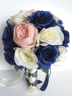 a bridal bouquet with blue, pink and white flowers