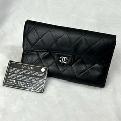 Vintage Chanel Lambskin Classic Quilted Flap Wallet As You See Photos, It Is Vintage Condition With Signs Of Wear, Light Scratches, Tiny Scuffs, Loose Interior Leathers And All Worn Outline Trims/ Edges Of Black Leather That Are Covered With Black Leather Polish. So, When You See Closely, You Can See All Worn/Torn Edges But Can’t Really Tell From Far Interior Has No Tear Or Rips So, Still Many Years To Be Loved! Approx 7” X 4.25” X 1.5” Sanitized Comes With A Matching Serial Number Card Last Pic Chanel Flap Card Holder, Chanel Classic Card Holder, Chanel Classic Wallet On Chain, Chanel Lambskin Clutch, Black Chanel Wallet, To Be Loved, Number Cards, Chanel Black, Vintage Chanel