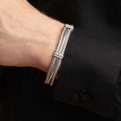 Our Maschio Men's Cuff Bracelets are masculine but luxurious with fine details. Choose from various options, each with different features. This bangle is larger in size and is standard length to fit most men's wrists. Made in Italy. Category: BraceletMetal: Sterling SilverStones: Choice of Black or White Diamonds (both 0.05 ct)Closure: Open CuffCollection: Men's Jewelry Fits average men's wrist sizes of about 8 inches. Adjustable Luxury Sterling Silver Bracelet, Luxury Adjustable Sterling Silver Bracelet, Luxury Adjustable Jubilee Cuff Bracelet, Luxury Polished Cuff Bracelets, Classic Sterling Silver Cuff Bracelet For Formal Occasions, Luxury Adjustable Cuff Bangle, Adjustable Luxury Bangle For Formal Occasions, Luxury Adjustable Sterling Silver Bracelet With Polished Finish, Minimalist Formal Cuff Bracelet