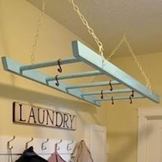 an old ladder for the laundry room - perfect for hanging things to dry