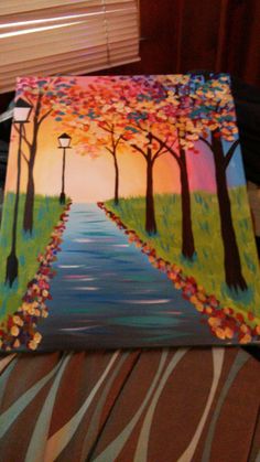 a painting of a pathway with trees and street lights painted on it's sides