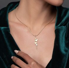 "This is a unique necklace, inspired by ivy leaves. It's 3 dimensional because there are two layers of leaves. It's made of 14k gold and the pendant has an elegant matte finish. You can choose which color 14k gold it will be made of - yellow or white gold I plate the white gold with rhodium, as is common in white gold jewelry. The size of the pendant is 1.36 \\ 0.47 inches ( 3.5 \\ 1.2 cm ) It comes on a necklace that is 16.4 inches ( 42 cm ) or 17.6 inches ( 45 cm ) long. I'll contact you after Gold Vine Necklace, Gold Leaf-shaped Jewelry Gift, Ivy Leaf Jewelry, Vine Leaf Necklace, Yellow Gold Leaf Necklace For Gift, Ivy Necklace, Leaves Necklace, Gold Leaf Necklace, Ivy Leaves