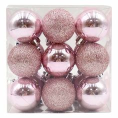 pink and silver ornaments in a clear box