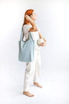 "Linen tote bag perfect for everyday use. Beautifully made of high-quality linen that feels lovely to the touch. Linen is environmentally friendly, durable, and looks better and better with age. Which is your favorite color? Ocean / Olive / Terracotta Color in the picture: Ocean Standard bag size: (as in the photos) 40x42x10 cm / 16x17x4\" Handles size: (strap drop length) 34 cm / 13\" Larger bag size: 50x44x10 cm / 20x17x4\" Handles size: (strap drop length) 40 cm / 16\" *Custom size available. Blue Tote Bag Outfit, Ocean Tote Bag, Linen Tote Bag, Unique Womens Fashion, Blue Tote Bag, Summer Blanket, Natural Linen Fabric, Oversized Tote Bag, Blue Tote