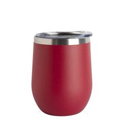 a red wine tumbler sitting on top of a white table