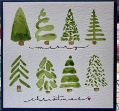 watercolor christmas trees on white paper with black ink