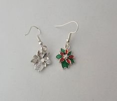 * Delicate Christmas poinsettia red and green enamel earrings. Wonderful poinsettia flowers festive stocking filler gift for her. Ideal secret santa gift.* Reverse of the poinsettia earrings can be seen on the left of picture 2. * Measurements of the length and width can be seen in pictures 3 and 4. * Earrings are handcrafted to order and can be customised to buyers’ preference. Please select your preferred earring hook during the order process. Working left to right in picture 5, choose from: C Poinsettia Earrings, Flowers Winter, 4 Earrings, Poinsettia Flowers, Winter Earrings, Stocking Filler Gifts, Poinsettia Flower, Christmas Poinsettia, Earring Hook