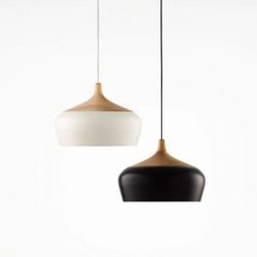 two black and white lights hanging from the ceiling