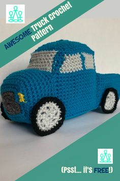 a crocheted blue toy car sitting on top of a table