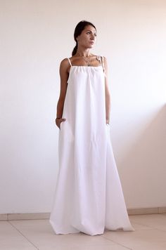 "White Linen Dress, Sleeveless Dress, Maxi Dress, Long Dress, Baggy dress, Linen dress, Minimalist Dress, Loose Dress, UrbanMood - Um-253-LN Feel special and feminine with this white linen sleeveless maxi dress. Adjustable straps and pockets. Made of high quality linen fabric. This casual dress is perfect for your vacation, travel or just a lazy weekend . CAN BE MADE ACCORDING TO YOUR SIZE OR MEASUREMENTS! NO EXTRA FEE FOR PLUS SIZES! ENJOY THE UNIQUE DESIGN AND ALWAYS BE IN A GOOD MOOD!☺ MATERI Baggy Dresses, White Linen Dress, Minimalist Dress, Dress Minimalist, Long Linen Dress, White Linen Dresses, Maxi Dress Long, Warm Dresses, Minimalist Dresses