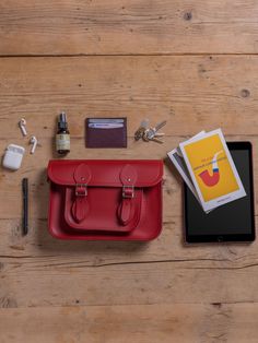 Oxblood, Clay and Navy: three timeless colours complementing each other beautifully in our signature leather. The Batchel - a Satchel with a top handle - bears all the hallmarks of The Cambridge Satchel but adds some of the practical features of a briefcase, including a nifty top handle and adjustable shoulder strap. This style features a useful interior front pocket discreetly embossed our logo on the nickel hardware of its magnetic closures and on the reverse of the bag, so you know it's a gen British School, Oxblood Leather, Leather Product, Fall Fit, Popular Bags, Colour Inspiration, Leather Satchel Bag, Color Complement, Nickel Hardware