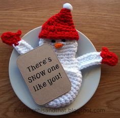 there's snow one like you ornament on a plate with a tag