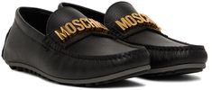 Grained leather loafers in black. · Moc toe · Logo hardware at vamp · Logo embossed at heel counter · Buffed leather lining · Treaded rubber sole Supplier color: Black Moschino Men, Moccasins Shoes, Penny Loafers, Leather Loafers, Black Cream, Loafer Shoes, Moccasins, Moschino, Drums