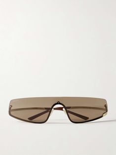 Shop GUCCI EYEWEAR Rimless rectangle-frame gold-tone sunglasses, Explore the latest GUCCI EYEWEAR women's collection today on NET A PORTER Elegant Luxury Miu Miu Sunglasses, Gucci Hexagon Sunglasses, Luxury Rectangular Shield Sunglasses For Summer, Luxury Rimless Shield Sunglasses, Rapper Sunglasses, Gucci Sunglasses Women, Net A Porter, Gucci Eyewear, Rimless Sunglasses