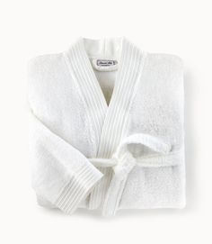 If you're looking for Peacock Alley's softest bathrobe, you've come to the right place. Our Bamboo Bathrobe, in our opinion, is the perfect robe to slip into after a warm shower or bath. 60% Rayon from bamboo / 40% Cotton Constructed with a terry loop for hanging and a corded dobby border detail. Imported from Portugal Dimensions Small/Medium Front chest width: 27"Sleeve length: 20"Length from shoulder: 44" Large/Extra Large Front chest width: 29"Sleeve length: 22"Length from shoulder: 48" Care White Long Sleeve Bathrobe, Cozy White Robe For Relaxation, White Long Sleeve Bath Robe, White Cozy Sleep Robe, Cozy White Sleep Robe, Cotton Long Sleeve Robe For Spa, Long Sleeve Cotton Robe For Spa, Long Sleeve Cotton Spa Robe, White Long Sleeve Robe For Relaxation