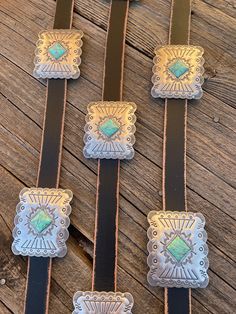 The perfect concho belt just brings your whole outfit together! Measures taken from buckle to first and last hole. Sizing is as follows: Small/Medium: 29.5-35.5 inches. Medium/Large: 33-39 inches. Large/XLarge: 37-43 inches. Genuine leather Square metal conchos with faux turquoise stones Conchos are approximately 1.75” x 2” Concho Belt, Black Square, Black Belt, Turquoise Stone, Buckle, Genuine Leather, Square, Turquoise, Stone