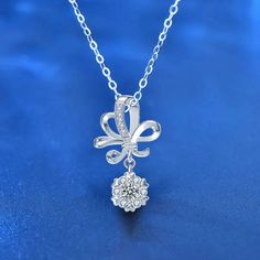 Showcase your personality with LOVCIA Beautiful Moissanite CZ Wedding Bouquet Flower 925 Sterling Silver Necklace. 🌟Unique pendants for every style at LOVCIA. Shop https://lovcia.com/products/lovcia-beautiful-moissanite-cz-wedding-bouquet-flower-925-sterling-silver-necklace-lv23sbne1622 . #Lovcia #LovciaJewelry #GiftsForWomen #PendantNecklaces #Necklaces #NecklacesForWomen #Women'sNecklaces #PersonalStyle #Pendants #JewelryForWomen #JewelryForGirls #GiftForHer #GiftForLove #LatestPendantStyl... Silver Flower Necklace, Bouquet Flower, Bow Necklace, Silver Bow, Unique Pendant, Flower Bouquet Wedding, Friendship Gifts, Silver Accents, Metal Material