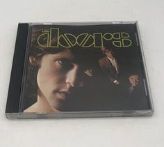 the doors cd with an image of two men on it