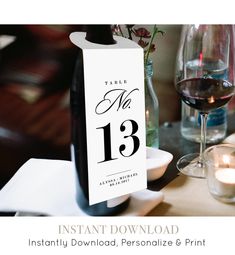 a table number with a glass of wine