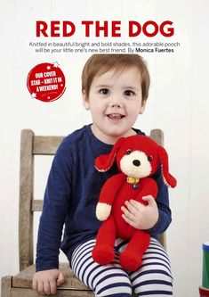 a little boy sitting on a chair holding a red dog stuffed animal in his hands