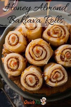 honey almond bakrara rolls on a platter with text overlay that reads, honey almond bakara rolls