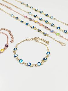 Evil Eye Bracelet is adjustable, it comfortably fits on any wrist. Evil eyes are believed to protect the person who carries them. Evil eye charms are also believed to bring good luck and deflect the negative energy. This Evil eye beaded bracelet can be a perfect gift. There are 7 Evil eye beads on this Turkish Eye Bracelet. For more evil eye bracelets, click the link below; https://www.etsy.com/shop/EyeDesignsbyGG?ref=search_shop_redirect&section_id=30219689 Adjustable Metal Evil Eye Bracelet, Adjustable Metal Evil Eye Charm Bracelet, Adjustable Multicolor Chain Bracelet, Colorful Evil Eye, Evil Eye Beaded Bracelet, Gold Evil Eye Bracelet, Minimal Bracelet, Eye Bracelets, Bracelet Evil Eye