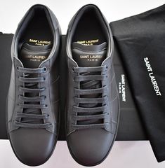 SAINT LAURENT PARIS Brand: SAINT LAURENT Paris Product Size: EUR-40 (or US-7) Insole length: 10 3/8 inches. Width: 3 1/2 inches. Color: dark gray Details: - SL/01  - Lace-Up fastening - Perforated Stripes along sides - Signature embossed back tab - Made in Italy - Men's Material: leather upper, leather lined, rubber sole. Condition: new in original box.  100% authentic. United States: USPS or FEDEX Standard Mail - FREE SHIPPING Worldwide Shipping: cost varies by buyer's location * We ship Monday through Friday excluding weekends and holidays. * Our handling time is 2 business days after receiving cleared payment. * Estimated delivery dates include seller's handling time, origin ZIP code, destination ZIP code and time of acceptance, and will depend on shipping service selected and receipt o Luxury Gray Sneakers With Round Toe, Luxury Gray Round Toe Sneakers, Saint Laurent Paris, Saint Laurent Shoes, Gray Leather, Sneakers Shoes, Grey Leather, Mens Casual Shoes, Mens Shoes Sneakers