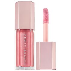 An ultimate, gotta-have-it lip gloss with explosive shine that feels as good as it looks.Highlighted Ingredients: - Shea Butter: Conditions skin. Ingredient Callouts: Free of parabens and phthalates. This product is also cruelty-free.What Else You Need to Know: This universal lip luminizer delivers explosive shine in six shades that flatter all skin tones. One swipe of Gloss Bomb’s XXL wand leaves lips looking instantly fuller and smoother. The non-sticky formula is super shiny, and has an addic Lip Gloss Sephora, Alat Makeup, Luminizer, Eyeshadow Tutorial, Beauty Inside, Benefit Cosmetics, Fenty Beauty, Pink Lips, The Body Shop