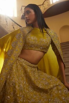 Yellow raw silk bridal lehenga featuring zardozi embroidered floral and foliage patterns highlighted by scalloped hem. Comes with matching zardozi embroidered blouse. Paired with sequin embellished scalloped hem dupatta. - Aza Fashions Elegant Dresses With Motifs For Reception, Elegant Dresses With Decorative Motifs For Receptions, Yellow Wedding Choli With Motifs, Wedding Yellow Choli With Motifs, Gold Sets With Motifs For Reception, Elegant Wedding Choli With Motifs, Wedding Sets With Motifs, Wedding Dresses With Motifs, Fitted Wedding Dress With Motifs