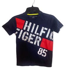 Tommy Hilfiger Screen Printed Graphic Tee Front Graphic Sleeve Embroidery Short Sleeve Crew Neck New Without Tags Size 18m, 3t & 5 Navy Tommy Hilfiger Navy Short Sleeve Top, Tommy Hilfiger Blue Summer T-shirt, Blue Tommy Hilfiger T-shirt With Letter Print, Tommy Hilfiger Blue T-shirt With Letter Print, Tommy Hilfiger Blue Logo Print Tops, Sleeve Embroidery, Boys Graphic Tee, Tommy Hilfiger Shirts, Kids Shirts