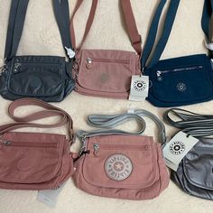 Price Per Piece Polyester Dimensions: 7.75''L X 5.75''H X 3.25''D Weight: 0.38 Lbs Volume: 2l Adjustable Strap Front Zip Pocket Flap Closure With Magnetic Snap Internal Zip Pocket Monkey Keychain Shortest Strap Length: 27.5" Extended Strap Length: 53.25" Navy Crossbody Bag, Monkey Keychain, Kipling Bags, Green Purse, Convertible Bags, Mini Crossbody Bag, Girls Fashion Clothes, Mini Crossbody, Black Nylons