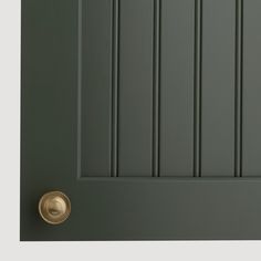 a close up of a door with a knob on the front and side paneling